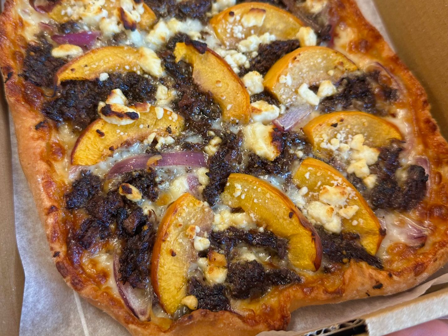BBQ beef pizzetta with three cheeses and feta